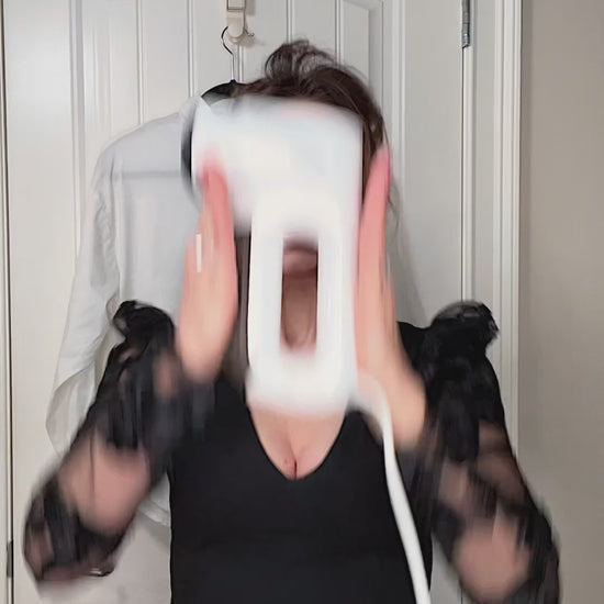 Neakasa handheld clothes steamer shown in use, providing fast and consistent steam to remove wrinkles from shirts, blouses, and everyday garments. The compact and lightweight design makes it suitable for home use or travel, while the 1800W heating system delivers quick warm-up and strong steam flow. The 280ml water tank offers several minutes of continuous steaming for multiple clothing pieces. This steamer works well on cotton, linen, silk, wool, and synthetic fabrics, making it a versatile solution for qu